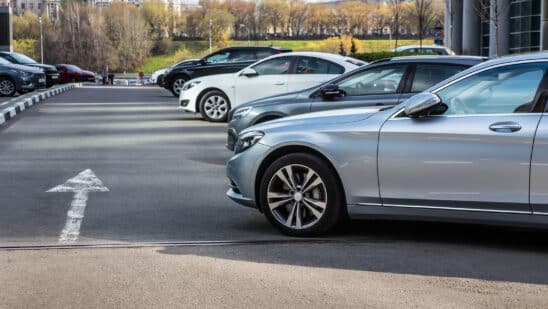 Cars in an office building parking lot