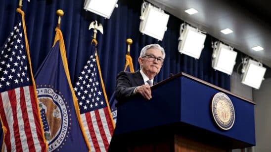 Fed pauses rate hikes but signals more tightening to come