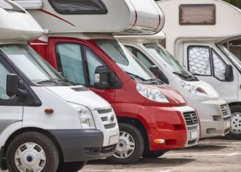 Recreational vehicles in a parking lot