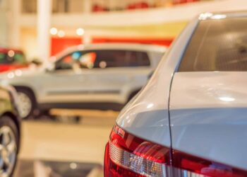 Stock of cars in showroom of automobile dealer