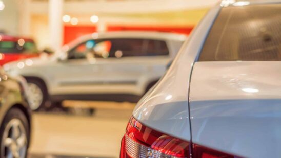 Stock of cars in showroom of automobile dealer