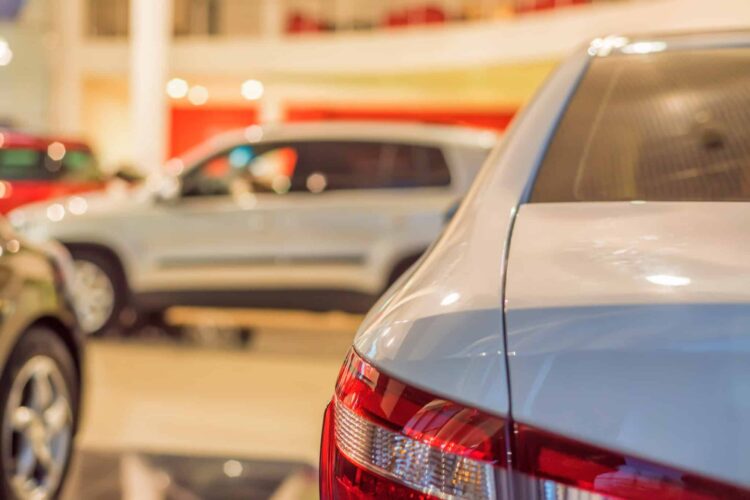 Stock of cars in showroom of automobile dealer