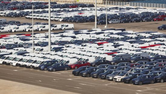 New Vehicles In Parking Lot Ready To Be Shipped