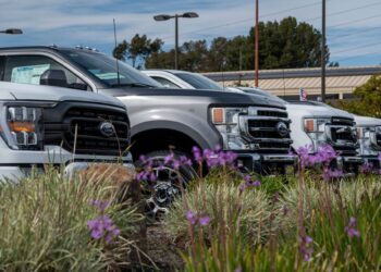 Vehicles for sale at a Ford dealership in Richmond, California, US, on Tuesday, Feb. 21, 2023. The average price for a new vehicle in the US has jumped to almost $50,000, up 30% since 2019, according to JPMorgan.