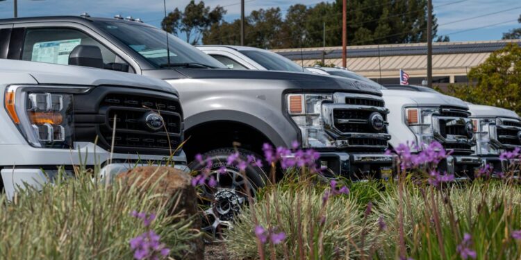 Vehicles for sale at a Ford dealership in Richmond, California, US, on Tuesday, Feb. 21, 2023. The average price for a new vehicle in the US has jumped to almost $50,000, up 30% since 2019, according to JPMorgan.