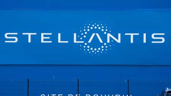 A Stellantis NV logo at the Automotive Cells Company (ACC) gigafactory in Douvrin, France, on Tuesday, May 30, 2023. Leaders and companies in Europe's biggest markets are increasingly balking at the ambitious pace of the continent's green push as they confront the massive costs associated with economic transformation.