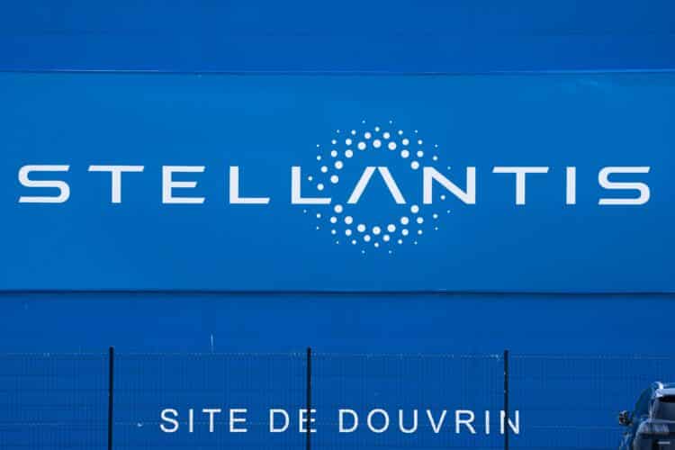 A Stellantis NV logo at the Automotive Cells Company (ACC) gigafactory in Douvrin, France, on Tuesday, May 30, 2023. Leaders and companies in Europe's biggest markets are increasingly balking at the ambitious pace of the continent's green push as they confront the massive costs associated with economic transformation.