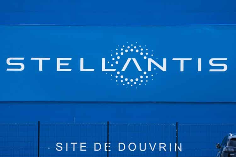 A Stellantis NV logo at the Automotive Cells Company (ACC) gigafactory in Douvrin, France, on Tuesday, May 30, 2023. Leaders and companies in Europe's biggest markets are increasingly balking at the ambitious pace of the continent's green push as they confront the massive costs associated with economic transformation.