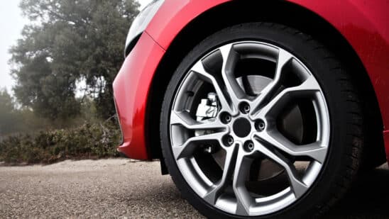 Close up of tire on red car