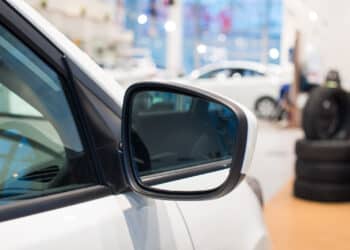 Car side mirror in a dealership