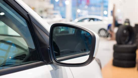 Car side mirror in a dealership