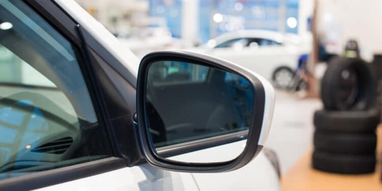 Car side mirror in a dealership