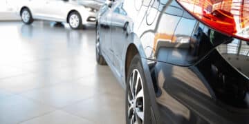 Close up of back of car in dealership showroom