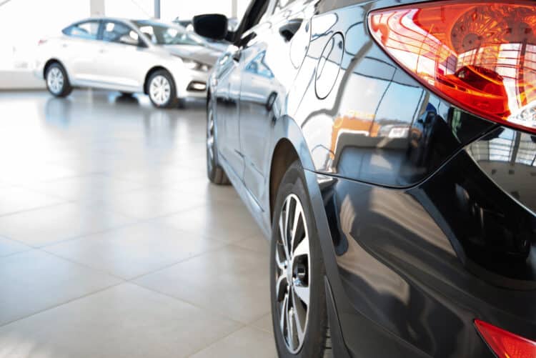 Close up of back of car in dealership showroom