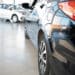 Close up of back of car in dealership showroom