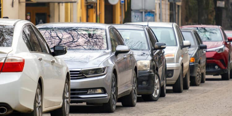 Cars parked along the side of the road