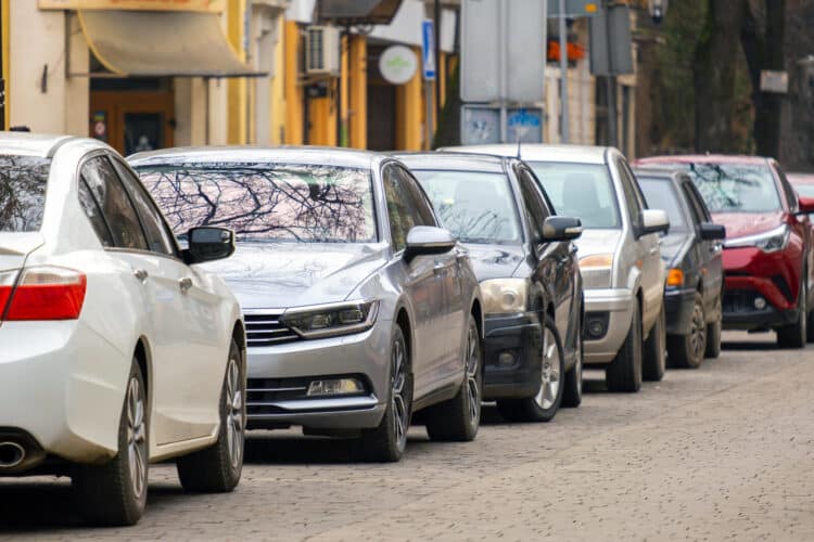 Cars parked along the side of the road