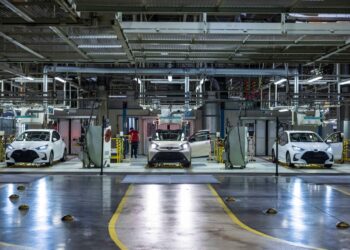 Automobiles in the quality control inspection area at the Toyota Motor Manufacturing plant