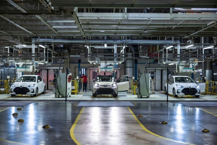 Automobiles in the quality control inspection area at the Toyota Motor Manufacturing plant