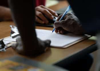 A man signs into a career fair hosted by the New Hanover NCWorks and the Cape Fear Workforce Development Board in Wilmington, North Carolina Wednesday, June 20, 2023. Photographer: Allison Joyce/ Bloomberg