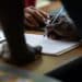 A man signs into a career fair hosted by the New Hanover NCWorks and the Cape Fear Workforce Development Board in Wilmington, North Carolina Wednesday, June 20, 2023. Photographer: Allison Joyce/ Bloomberg