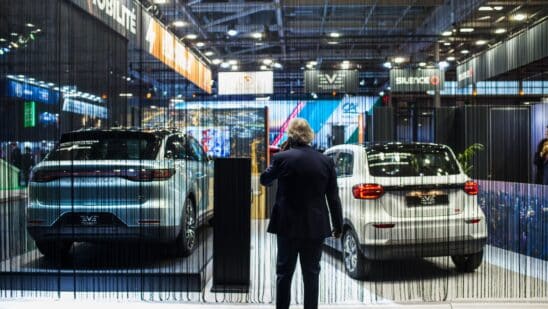 A Leapmotor C11 electric SUV, left, and a Leapmotor TO3 electric mini car on the opening day of the Paris Motor Show in Paris, France, on Monday, Oct. 17, 2022. The auto industry -- a slice of it at least -- converges in France this week for the biennial Paris Motor Show, also known as the Mondial de l'automobile.