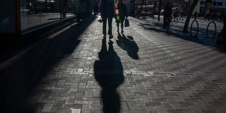 Shoppers on Market Street in San Francisco, California, US, on Tuesday, Nov, 29, 2022. US retailers eked out modest growth over Black Friday weekend with deep discounts that lured shoppers seeking a reprieve from stubborn inflation. Photographer: David Paul Morris/Bloomberg