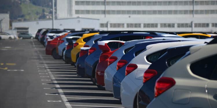 Cars lined up in a parking lot