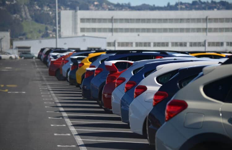 Cars lined up in a parking lot