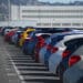 Cars lined up in a parking lot