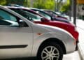 Cars lined up in parking spots