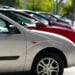 Cars lined up in parking spots