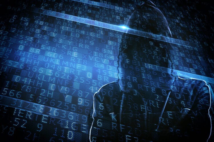 Hidden identity of a hacker with a man with hoodie