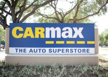 A sign for a CarMax dealership in Houston, TexasA sign for a CarMax dealership in Houston, Texas