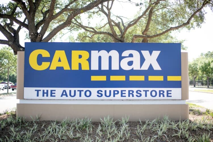 A sign for a CarMax dealership in Houston, TexasA sign for a CarMax dealership in Houston, Texas