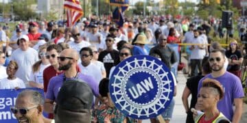 United Auto Workers (UAW) members and supporters march during a Labor Day parade in Detroit, Michigan, US
