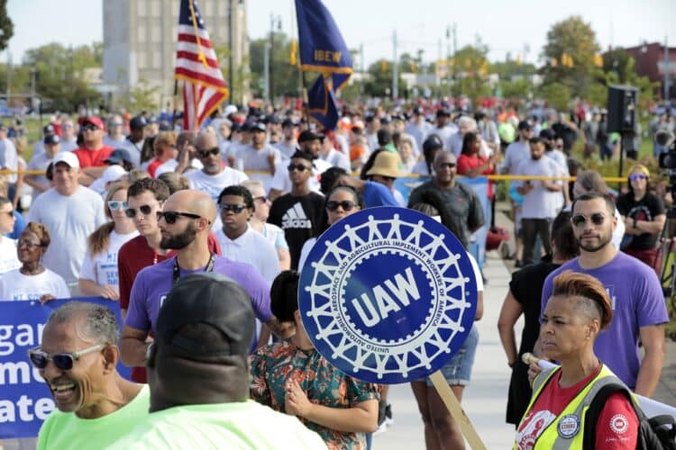 United Auto Workers (UAW) members and supporters march during a Labor Day parade in Detroit, Michigan, US