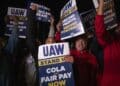 Supporters cheer as UAW members go on strike at the Ford Michigan Assembly Plant in Wayne, Michigan, on Sept. 15.