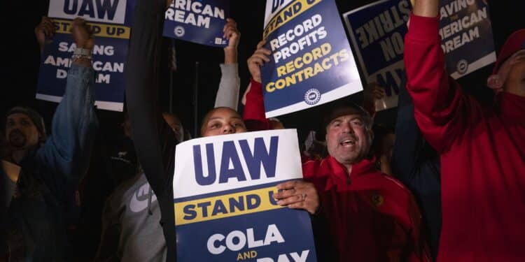 Supporters cheer as UAW members go on strike at the Ford Michigan Assembly Plant in Wayne, Michigan, on Sept. 15.