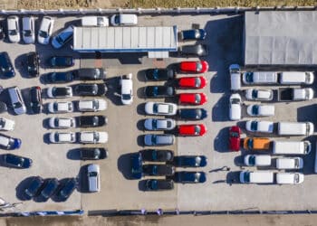 Aerial view of cars for sale on a dealer lot