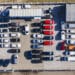 Aerial view of cars for sale on a dealer lot