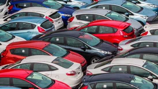 Cars in a lot waiting to be sold