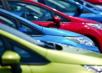 Variety of new cars ready for sale on a dealer lot