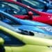 Variety of new cars ready for sale on a dealer lot