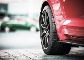 Close up of a tire on a red car