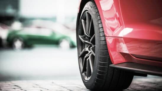 Close up of a tire on a red car
