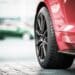 Close up of a tire on a red car