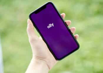 The Ally Financial Inc. logo on a smartphone arranged in Saint Thomas, Virgin Islands, United States, on Friday, Jan. 22, 2021. Ally Financial Inc. fell 5.3%, more than any full-day loss since June 26 as its sector declined.