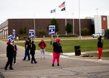 United Auto Workers (UAW) members and supporters on a picket line outside the General Motors Co. Flint Processing Center in Swartz Creek, Michigan, US, on Monday, Sept. 25, 2023. General Motors and Stellantis NV face walkouts at 38 more facilities as talks with their workers' union failed to make headway, even as Ford Motor Co. was spared the escalation after making progress in the negotiations.