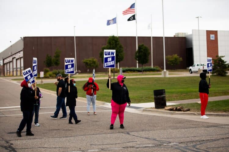 United Auto Workers (UAW) members and supporters on a picket line outside the General Motors Co. Flint Processing Center in Swartz Creek, Michigan, US, on Monday, Sept. 25, 2023. General Motors and Stellantis NV face walkouts at 38 more facilities as talks with their workers' union failed to make headway, even as Ford Motor Co. was spared the escalation after making progress in the negotiations.